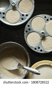 Rice Batter On Idli Maker. Top View Of South Indian Dish.