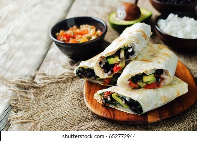 Rice Black Bean Avocado Tomato Burritos. Toning. Selective Focus