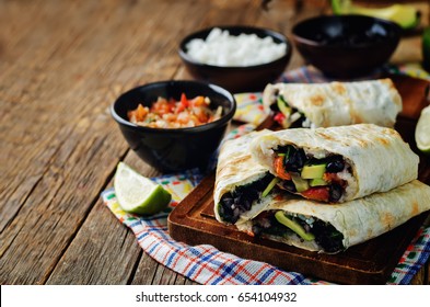 Rice Black Bean Avocado Tomato Burritos. Toning. Selective Focus