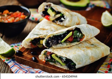 Rice Black Bean Avocado Tomato Burritos. Toning. Selective Focus