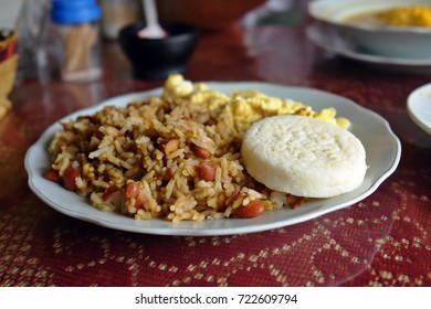 Rice With Black Bean Served With Omelette And Arepa, Colombian Food