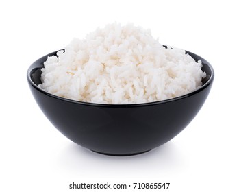 Rice in a bowl on a white background - Shutterstock ID 710865547
