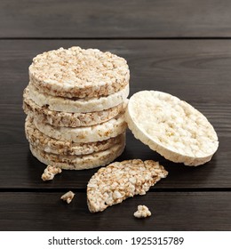 Rice And Buckwheat Cakes On A Wood Table.