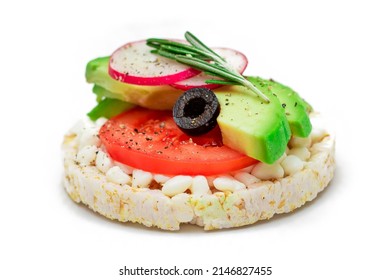 Rice Cake Sandwich with Avocado, Tomato, Cottage Cheese, Olives and Radish - Isolated on White. Easy Breakfast. Diet Food. Quick and Healthy Sandwiches. Crispbread with Tasty Filling - Isolation - Powered by Shutterstock