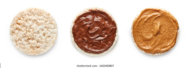 Rice Cakes With Chocolate Cream And Peanut Butter Isolated On White Background Top View