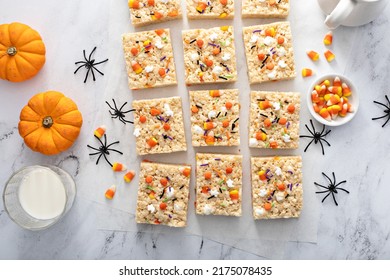 Rice Cereal Treats For Halloween With Candy Corn And Festive Sprinkles Overhead View, Flat Lay