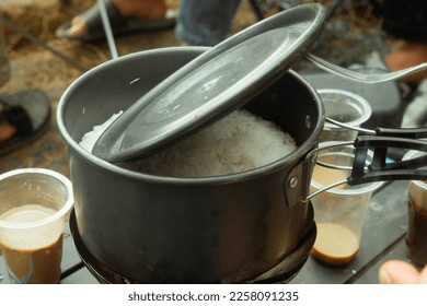 Rice cooker in the camp. camping equipment photography - Shutterstock ID 2258091235