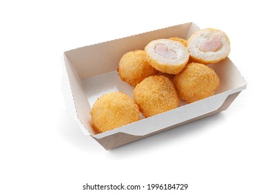 Rice Croquettes With Cottage Cheese And Shrimp In Bread Crumbs. Deep-fried. Delivery Box. Close-up. White Background. Isolated.