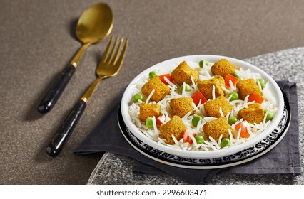 Rice dishes are a diverse category of cuisine that feature rice as a central ingredient. These dishes can vary widely in flavor, texture, and preparation method, and can be found in cuisines all over  - Powered by Shutterstock