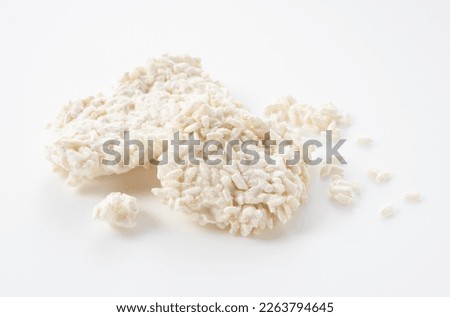 Rice malt placed against a white background. Koji mold. Koji is fermented rice.