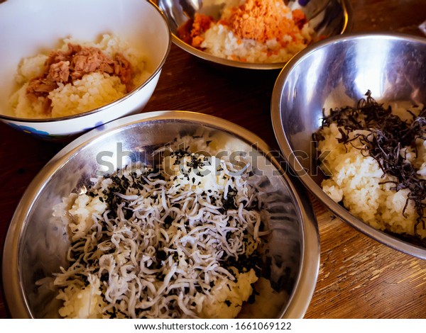 \
Rice mixed with fish in a\
bowl