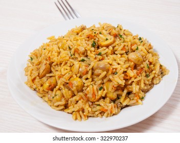 rice with mushrooms on plate