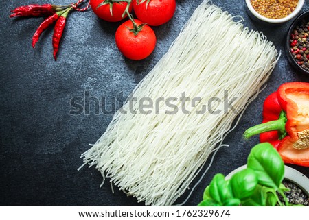 Asian ingredients and dishes on the table