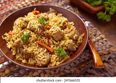 Rice pilaf with lamb meat and vegetables