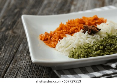 Rice Pulao In Indian Flag Color / Indian Republic Day Food /  Tiranga(Tri Color) Rice On Wooden Background, Selective Focus