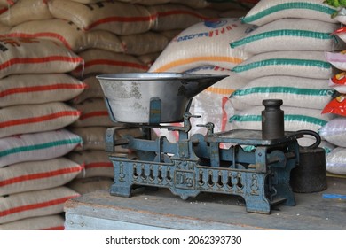 Rice Scale In Indonesian Traditional Market. Old Style Metal Scale.
