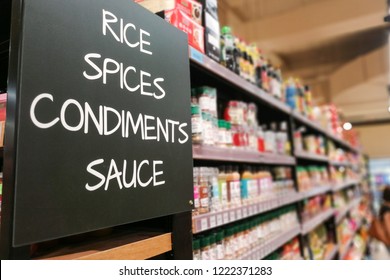 Rice, Spices, Condiments, Sauces Signage Grocery Categoy Aisle At Supermarket