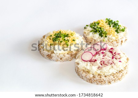 rice waffles for Breakfast, embittered with egg, green onions and radishes