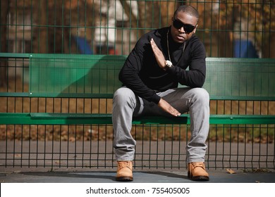 Rich African American Man Rapper With Sunglasses In City