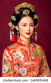 Rich Asian Brides In Burgundy Background