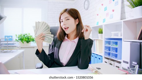 Rich Asian Business Woman Smile To You With Money