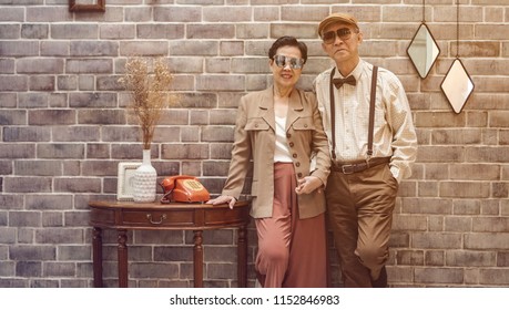 Rich Asian Senior Elder Couple Vintage Fashion In Luxury Home