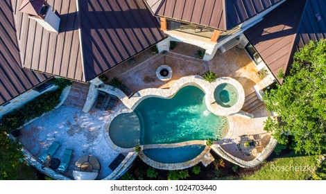 Rich Luxury Mansion Country Home North Of Austin , TX In The Ranch Lands Of Georgetown, Texas Circle Patterns Around A Infinity Pool Bring Elegance And Luxury To The Backyard.