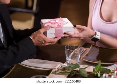 Rich Man Giving A Present To The Woman