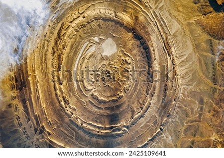 Richat Structure. This geologic feature has captured the attention of astronauts for about as long as   has sent humans into orbit around Earth. Elements of this image furnished by NASA.