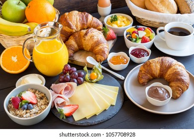 richly covered breakfast table