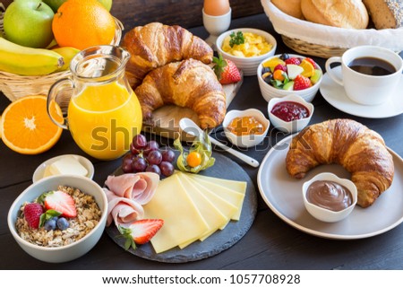 richly covered breakfast table