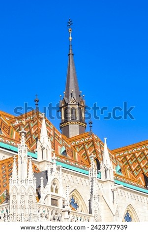 Richly decorated Matthias Church turrets Roman Catholic church ,Budapest, Hungary, in front of the Fisherman s Bastion at the heart of Buda s Castle District,December 17th 2014