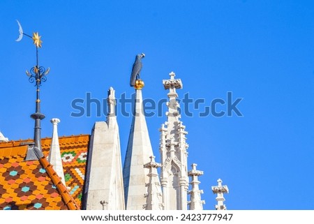 Richly decorated Matthias Church turrets Roman Catholic church ,Budapest, Hungary, in front of the Fisherman s Bastion at the heart of Buda s Castle District,December 17th 2014