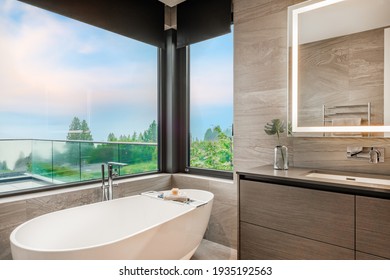 Richly toned bathroom with stone, glass and sauna