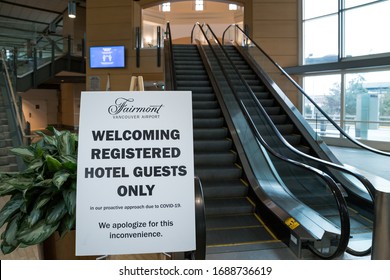 RICHMOND, BC, CANADA - MAR 29, 2020: A Public Health Notice Sign At YVR In Light Of The COVID-19 Coronavirus Pandemic.