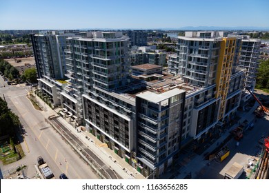 Richmond, Greater Vancouver, BC, Canada - July 16, 2018: Aerial View Of A Construction Site During A Sunny Summer Day.