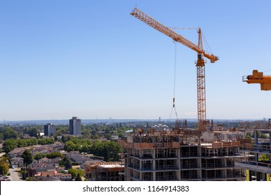 Richmond, Greater Vancouver, BC, Canada - July 16, 2018: Aerial View Of A Construction Site During A Sunny Summer Day.