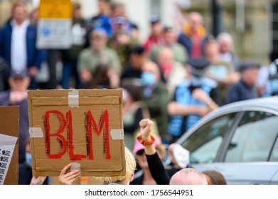 Richmond, North Yorkshire, UK - June 14, 2020: A homemade BLM sign held high at a Black Lives Matter protest