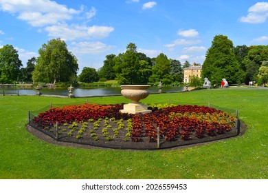 Richmond, UK - June 15 2021: The Royal Botanic Gardens host the largest most diverse living plants collection in the world including the oldest flower pot. Kew Palace is in their grounds by the Thames