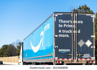 Richmond, USA - March 5, 2021: Highway Road In Virginia With Amazon Prime Shipping Delivery Truck Vehicle With Blue Prime Logo Sign Text