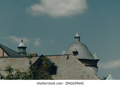 Richmond, VA, USA - 07 30 2021: Geometry Of Roofs Of Victorian Or Gilded Age Era Buildings In Maymont Park