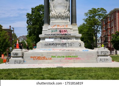 RICHMOND, VIRGINIA, USA - June 2, 2020: Base of Robert E. Lee statue defaced with graffiti during Black Lives Matter protest.