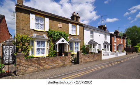 RICKMANSWORTH, UK - May 16, 2015. A terrace of English Victorian period mid to late 19th century cottages at Talbot Road, Rickmansworth, a small town in the county of Herfordshire, England, UK.