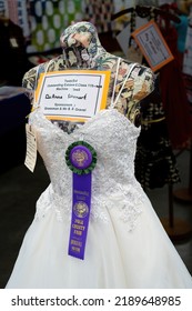Rickreal, Oregon - 8-11-2022:  A blue ribbon for best exibitor in the sewing category at a county fair near Rickreal Oregon