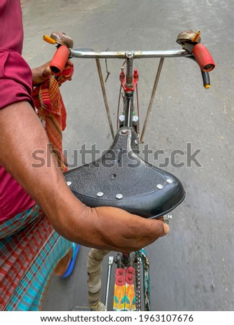 Rickshaw driver puller - hard work in Chittagong, Bangladesh