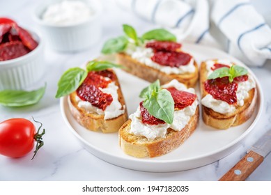 Ricotta Dried Tomato Basil Bruschetta. Toning. Selective Focus