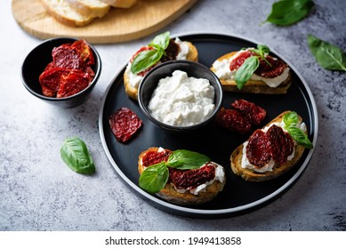 Ricotta Dried Tomato Basil Bruschetta. Toning. Selective Focus