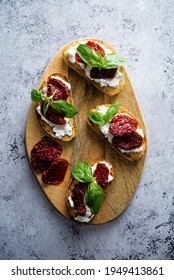 Ricotta Dried Tomato Basil Bruschetta. Toning. Selective Focus