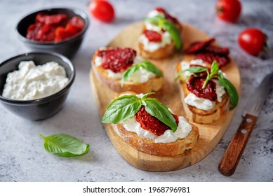 Ricotta Dried Tomato Basil Bruschetta. Toning. Selective Focus