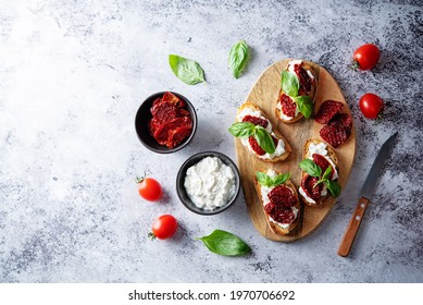 Ricotta Dried Tomato Basil Bruschetta. Toning. Selective Focus